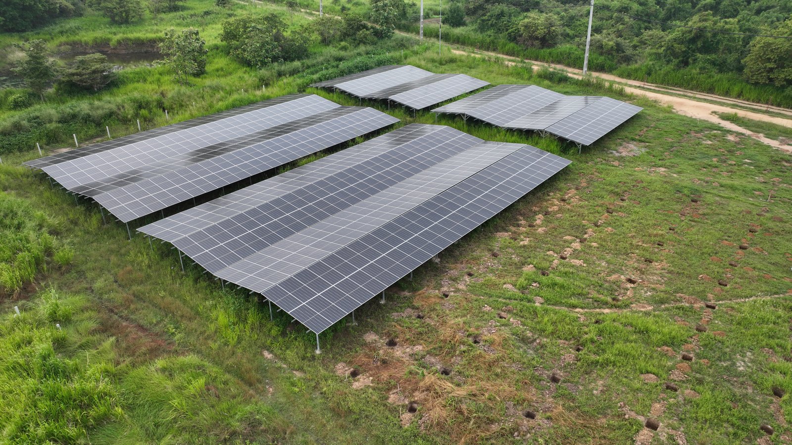 Ground mounted solar arrays in a green landscape in Sri Lanka